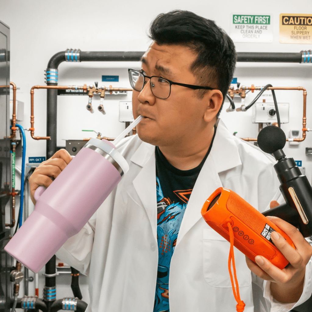 Jon Chan holding products from Temu